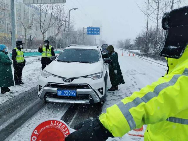 烟台开发区：抗击疫情，他们浴“雪”奋战